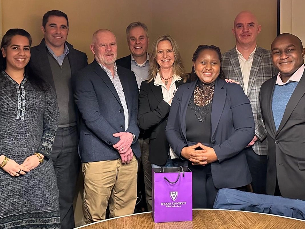 Meeting of minds. Front centre: Rhodes University Deputy Vice Chancellor, Dr Kwezi Mzilikazi and UK Trust Chair, Caroline Rowland flanked by trustees. 