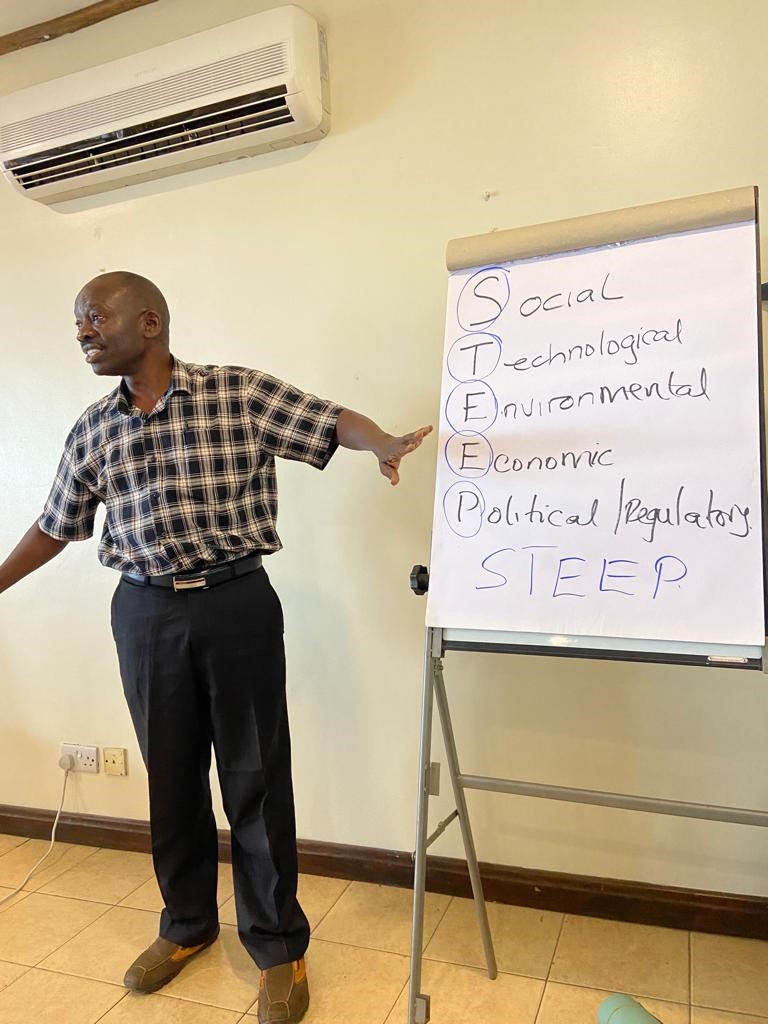 Figure 2: Professor Byaruhanga introducing STEEP to the stakeholders.