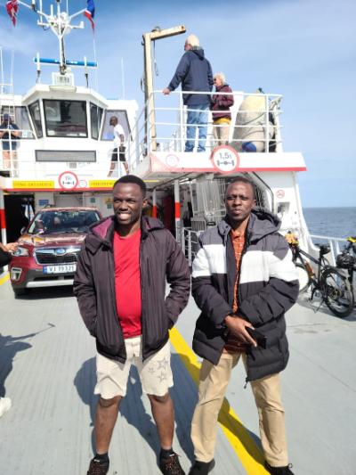 Enahoro and Edgar on a trip to Mausund Fieldstation, Norway