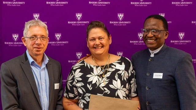 Dean of Commerce Professor Dave Sewry and Student Bureau Manager Desiree Wicks with Vice-Chancellor Professor Sizwe Mabizela at the Long-Service Awards