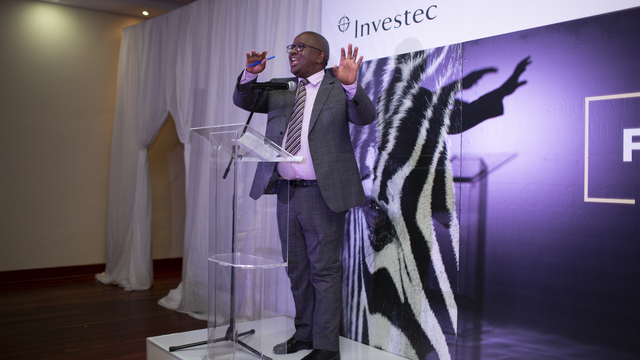 Investec representative, Mr Manchidi, at last year's award and welcome evening at Rhodes University