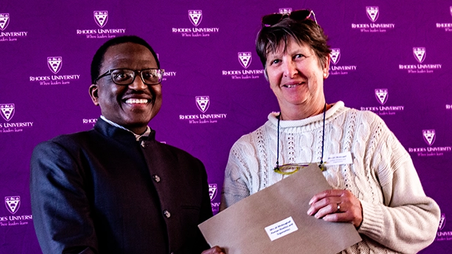 Vice-Chancellor Prof Sizwe Mabizela with Mrs June McDougall, who has worked at Rhodes University for 30 years
[PIC CREDIT: Gavin Gaka]