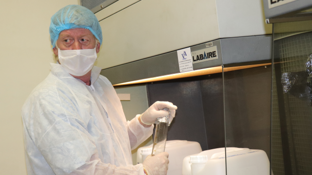 Professor Rod Walker manufacturing sanitiser in the Pharmacy lab