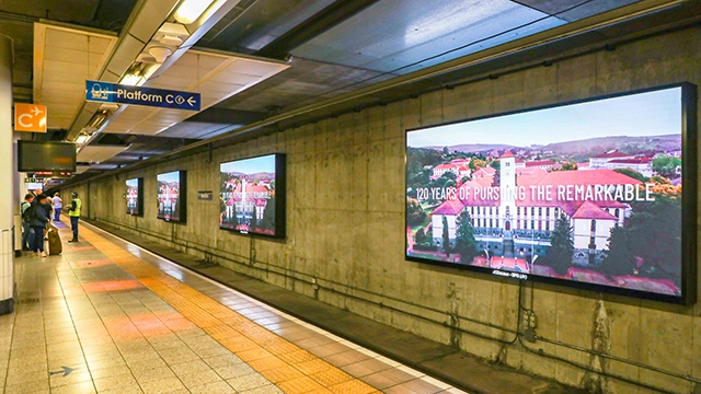 RU120 advert displays on Gautrain screens