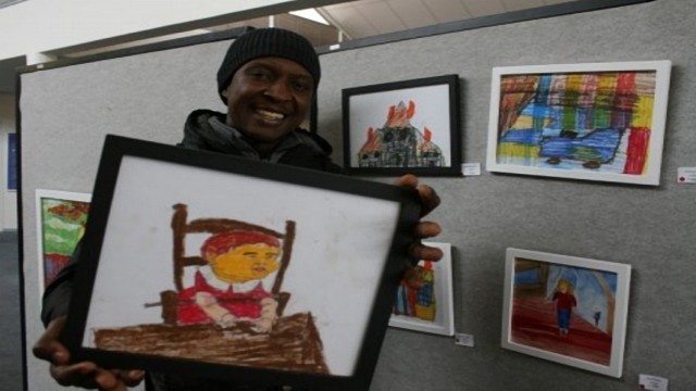 Dotun Makun with one of the artworks