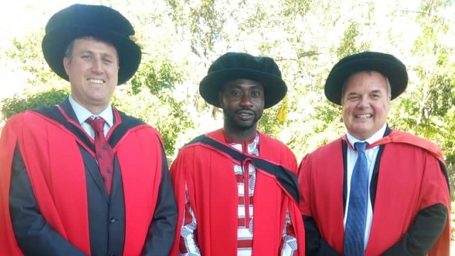Dr Egbon with his supervisors