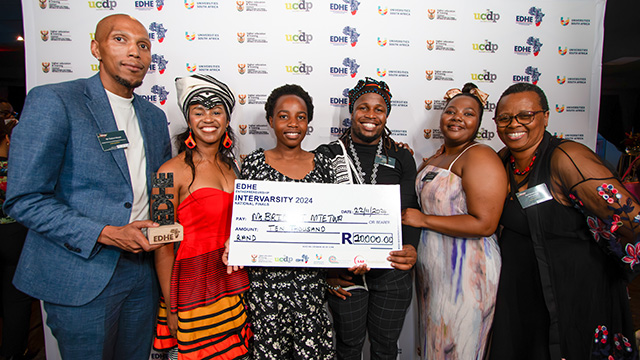 Bridget Mtetwa (third from left) accepting her prize