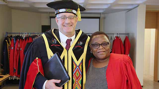 Professor Tebello Nyokong with Vice-Chancellor and Principal, Dr Albert van Jaarsv