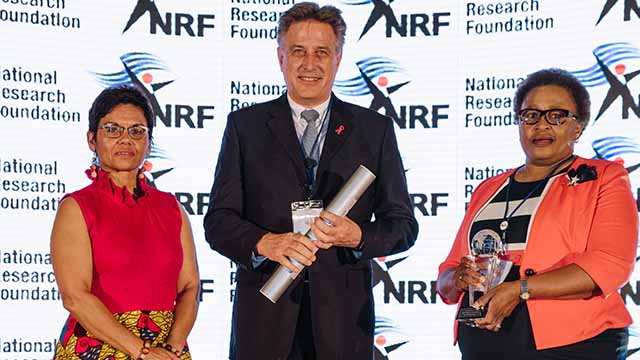 Dr Clayton accepts NRF P-Rating award on behalf of Dr Bennet