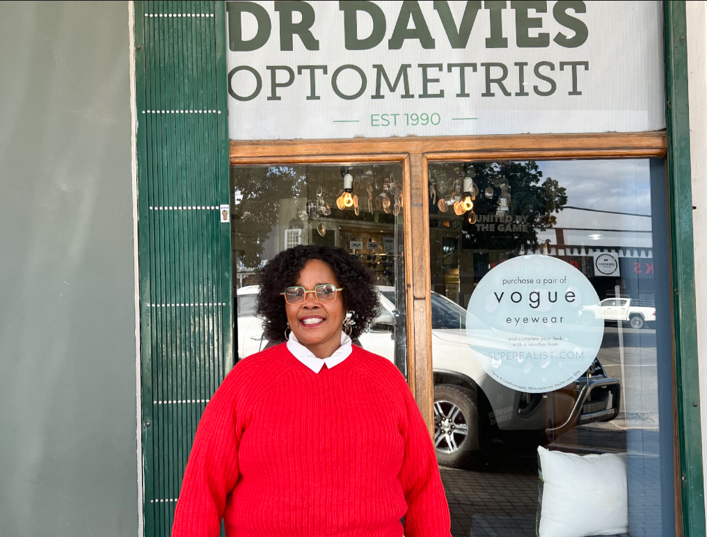 Limise Gagayi outside Dr Davies Optometrist where she works. Photo by Thato Didibeng.