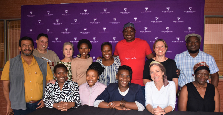 Students and lecturers pose for a photo during a welcome function to celebrate the launch of the inaugural PGDip in Sustainability Learning at Rhodes University.
