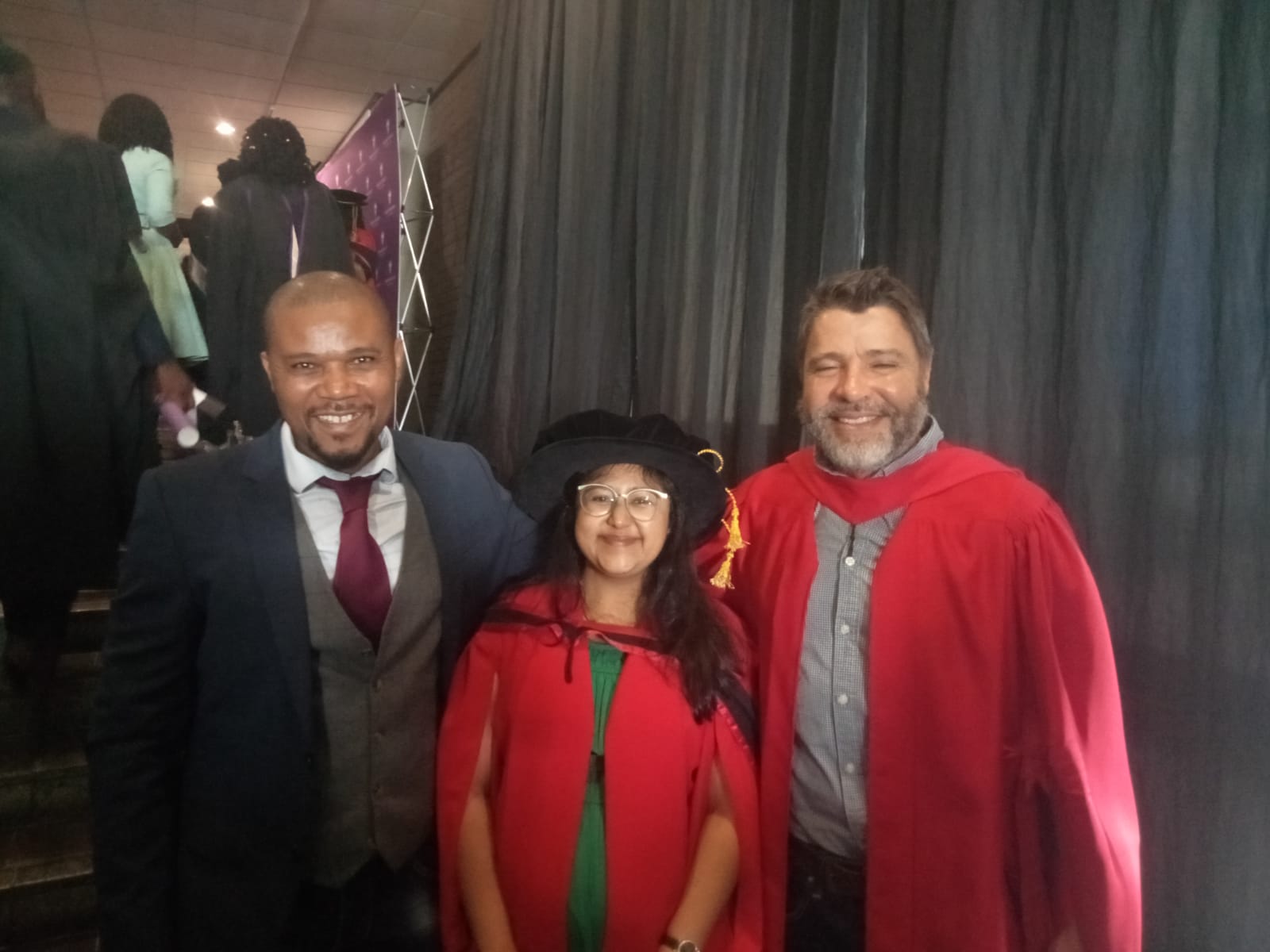 Dr R. Kara, Prof. M. Rogan (PhD supervisor) and Prof. CN Mbatha ( ISER Director)