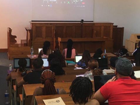 Students watching a guest lecture