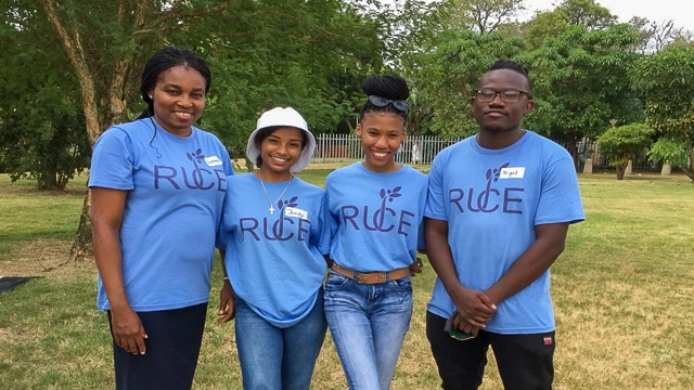 Jodi-Anne Rooi (second from the left) stands with other members of the Rhodes University Community Engagement team