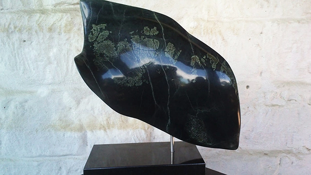 Iridescent Angel, serpentine stone by André Roodt