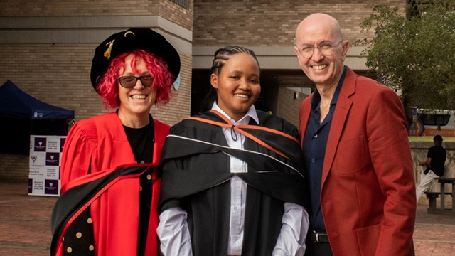 Anelisa Mfenyana stands between Dr Lise Westaway and GADRA education manager Dr Ashley Westaway, who have been caring for her in the absence of her parents