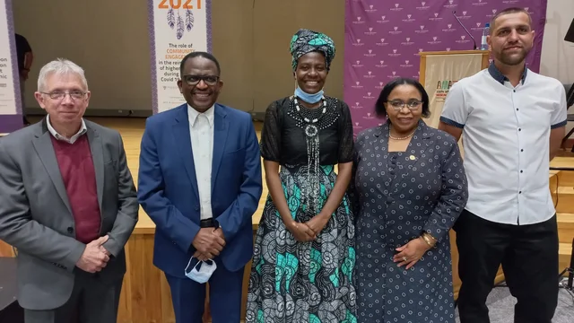 The Vice-Chancellor's 2020 Distinguished Community Engagement winner, Mapula Maponya flanked by Rhodes University's leadership and her fiance Jarmo Kalinski. 
