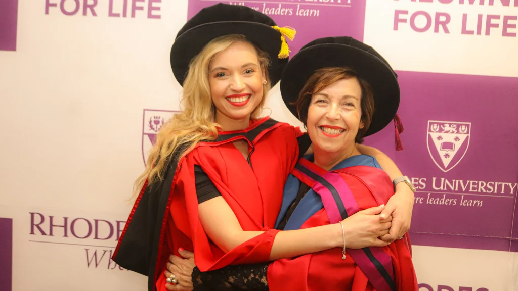 Management department Associate Professor, Nadine Oosthuizen congratulates her daughter, Dr Mikaela Oosthuizen, who recently graduated with PhD in Media studies. Photo Cred: Vusumzi Fraser Tshekema. 