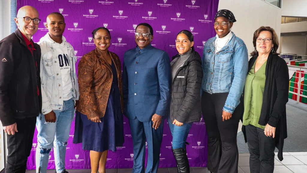 From left to right: GADRA Education’s Manager: Dr Ashley Westaway, Mawande Kwitsani, Nedbank Eyethu Community Trust representative, Bulelani Ntuli, Vice-Chancellor: Professor Sizwe Mabizela, Tyrah Sybil-Joykonck, Asisipho Lokwe and Community Engagement Director: Diana Hornby. 