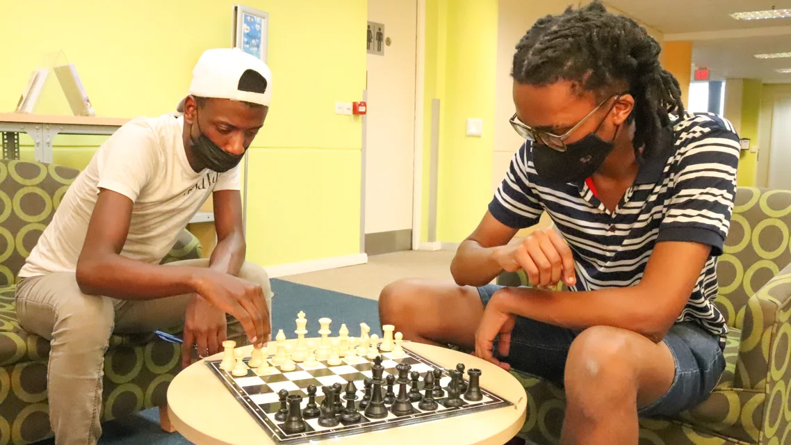 Checkmate: Rhodes University Chess Club Chairperson Lucas Mnguni playing with his deputy and SRC President, Botlhale Modisaotsile.  