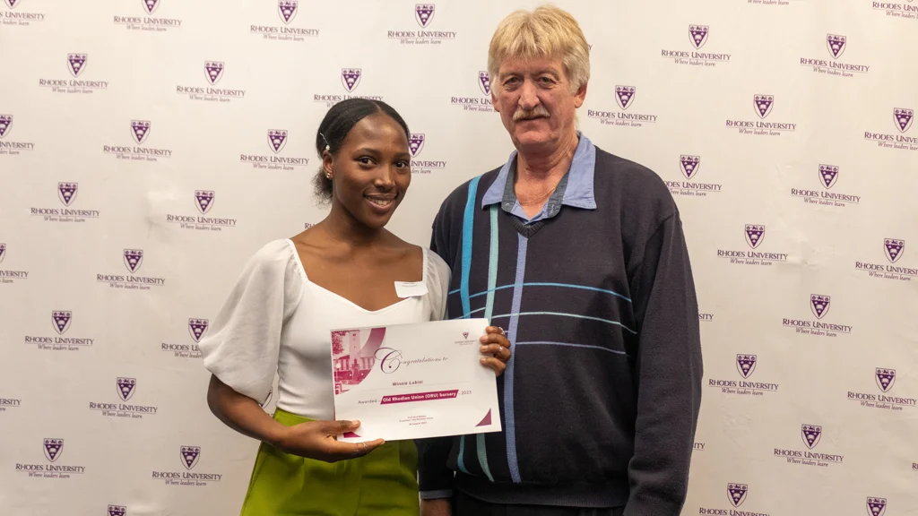 Old Rhodian Union President, Professor Rod Walker, with one of the bursary recipients, Winnie Lubisi. Photo cred: Vusumzi Tshekema. 