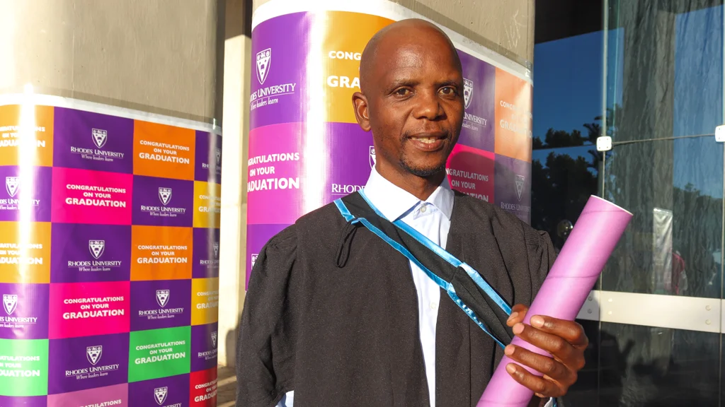 Rhodes University graduate, Joe Makhonza. Photo cred: Valentine Ntusi.