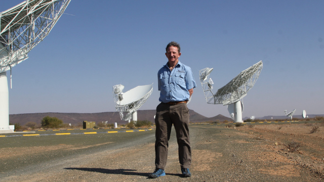 Professor Justin Jonas of Rhodes University among the radio telescopes he helped design and make functional. Image: Chris Marais