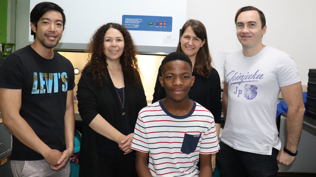 Rhodes University research team: Dr Lance Ho, Professor Janice Limson, Professor Adrienne Edkins and  Dr Shane Flanagan, with Konwaba Putsu (seated). 