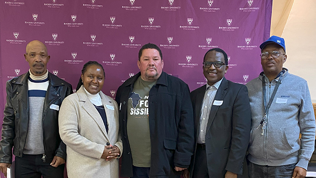 The Vice-Chancellor, Professor Sizwe Mabizela and DVC: Research, Innovation and Strategic Partnerships, Dr Kwezi Mzilikazi, stand with three of the four staff who have served for 35 years: Tude July, Ray Cannon and Sakhekile Mtunzi. 