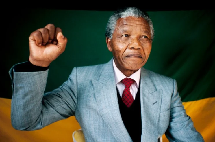 Former South African President Nelson Mandela shows the freedom salute after his release from prison. Image credit:© ruvanboshoff via iStockphoto. 