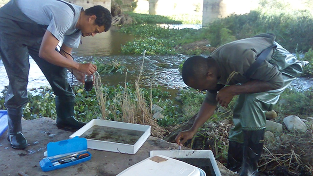Director of the IWR, Professor Nelson Odume (right), on a field trip at the Swartkops River 