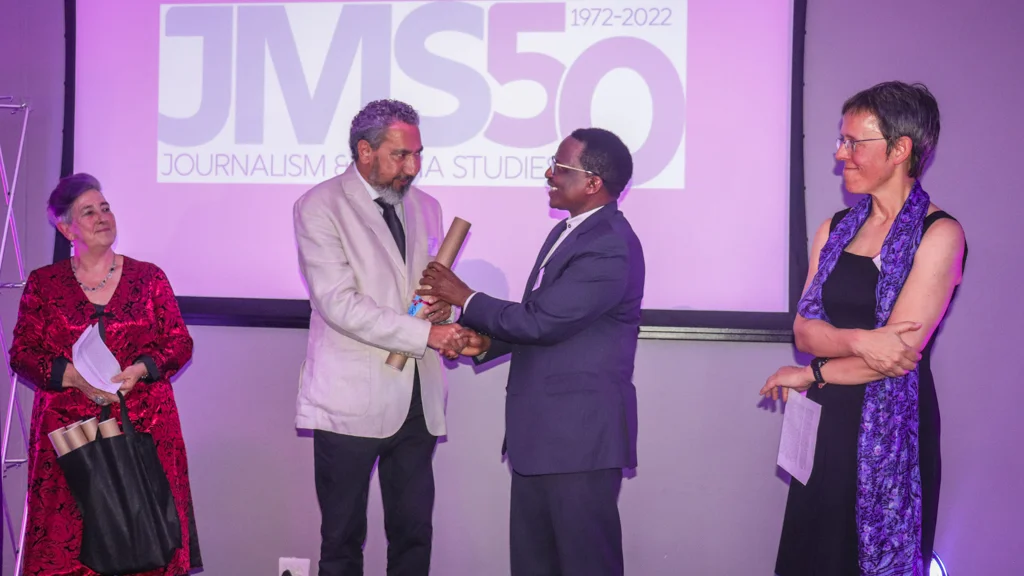 Ray Hartle receives his award from Professor Sizwe Mabizela at the JMS Gala Dinner