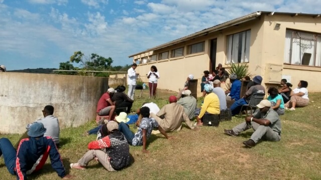 PhD Pharmacy student Theodore Orlando Duxbury engages the community