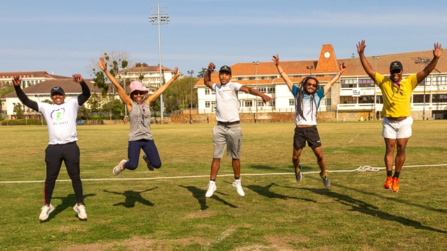 Staff members jump for wellness at last week's launch activities