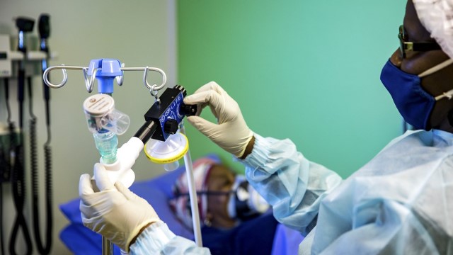 The LIFE ventilator, designed by the Council for Scientific and Industrial Research is demonstrated by a CSIR staff member at its campus in Pretoria East. (Photo: CSIR) 