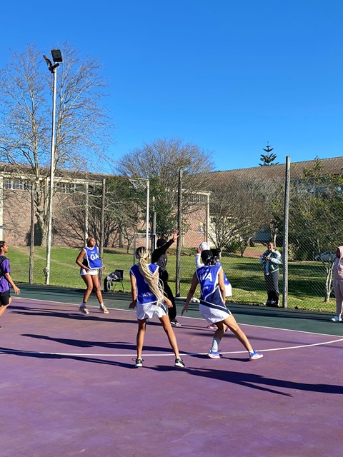 Netball Team playing a friendly match with Thomas Pringle